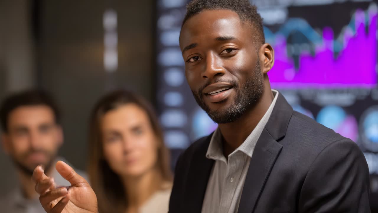 Engaging Business Presentation with a Focused Speaker Interacting with an Attentive Audience, Conveying Ideas and Insights in a Professional Environment Enriched by Dynamic Graphical Data Visualizations