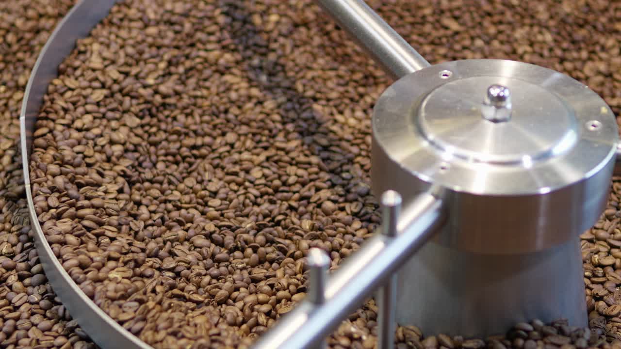 Explore the intricate coffee roasting process showcasing the transformation of raw beans.