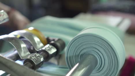 production and winding of fabric tape at a weaving factory close up