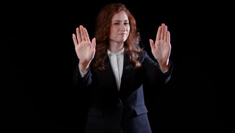 a caucasian businesswoman crosses hands and says no