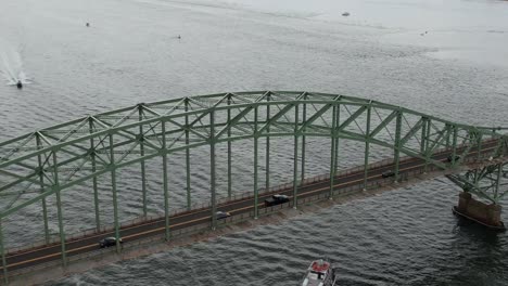 an aerial shot of the fire island inlet bridge on long island, ny