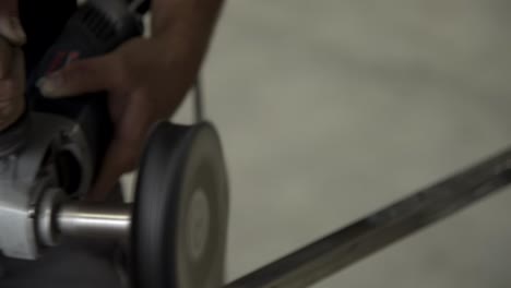 man cutting and polish stainless steel