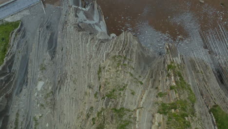 drone top view rotating above itzurun beach zumaia spain