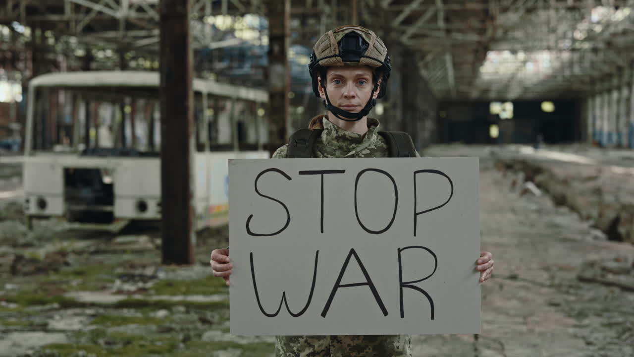 Soldier Protesting War in Abandoned Factory