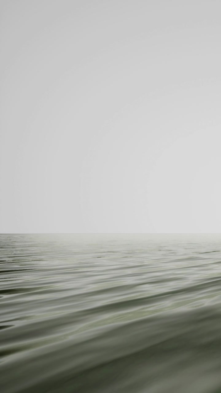 Wide view of calm water under cloudy sky in a quiet environment