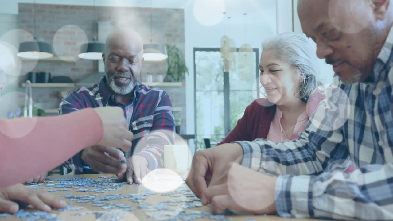 Animation of spots of light over diverse senior people playing game in garden