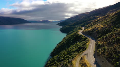 aerial view of the scenic drive along lake pukaki in the southern alps mountains of new zealand