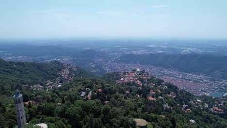 Aerial-view-of-Faro-Voltiano-Lighthouse-in-Brunate,-Como-lake,-North-Italy,-near-Lecco-in-Brianza-and-Lombardy