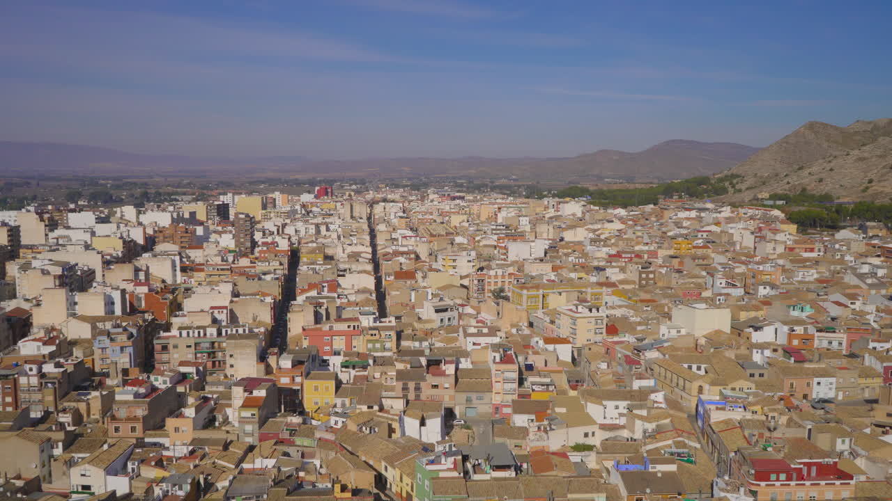 A landscape view with the city in Villena over The Atalaya Castle, province of Alicante, southern Spain, Located over a spur of the Sierra de la Villa.