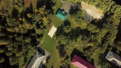 aerial view of a park with sports courts and buildings