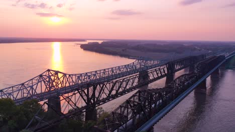 good aerial at sunset over three bridges over the mississippi river near memphis tennessee