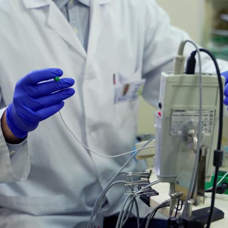 doctor preparing medical equipment. close up of doctor hands using medical equipment