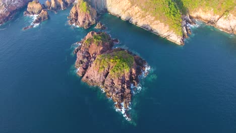 looking down on a rocky outcropping from an archipelago chain of islands off the coast of mexico