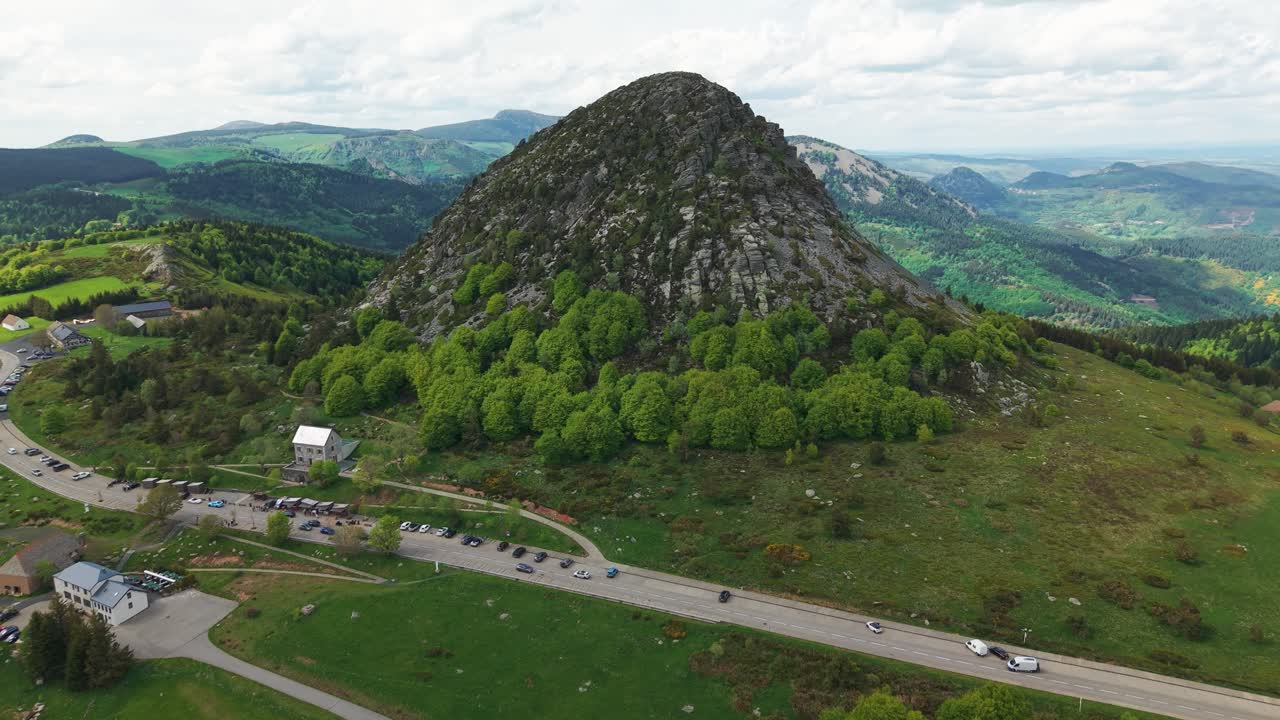 aerial shot flying over the Mont Gerbier de Jonc and revealing the landscape of The Ardeche departement in Auvergne Rhone Alpes region, France