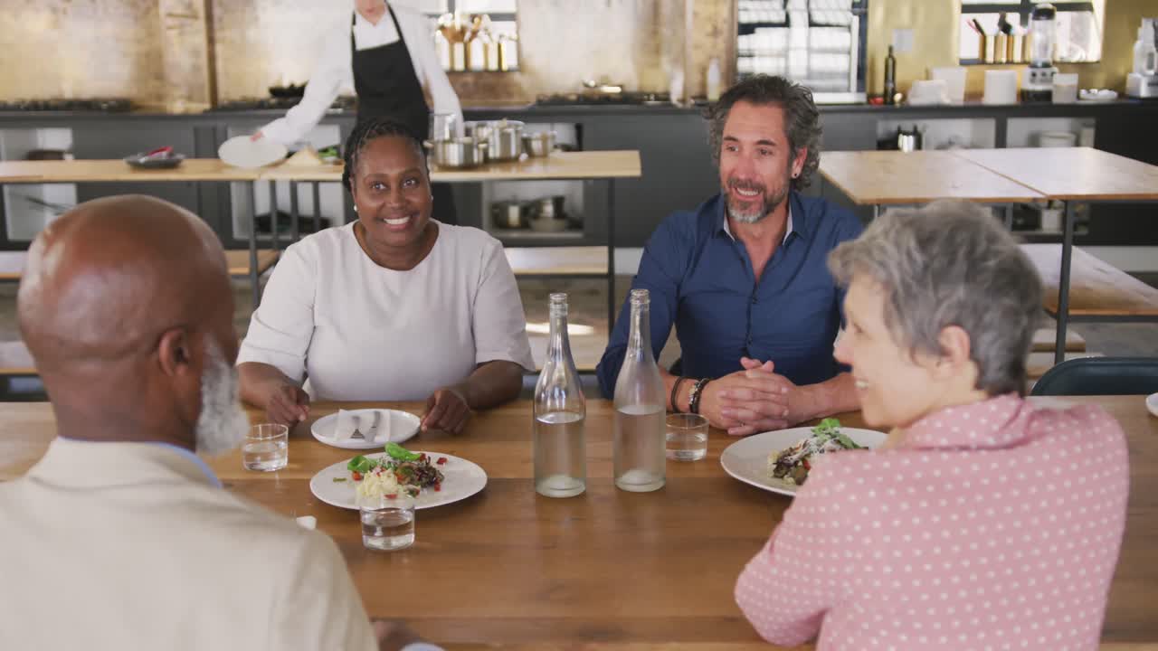 Friends talking at the table
