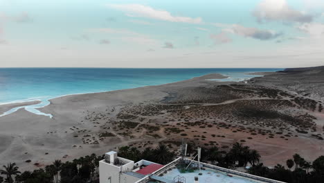 Aerial-drone-view-of-the-coast-line-of-the-Sotavento-coast-line-at-sunset