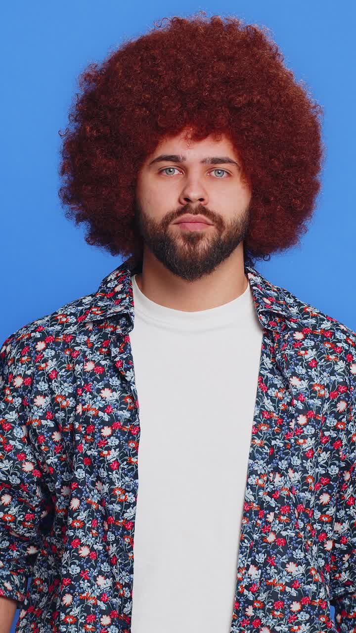 Frightened stylish man closing mouth with hands refusing to tell terrible secret unbelievable truth