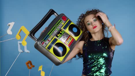 woman with tape recorder enjoying music