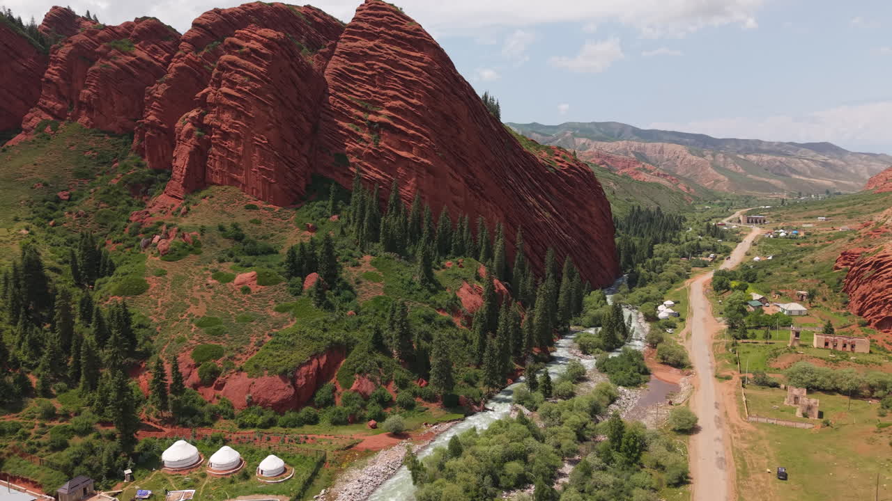 Jeti-Ögüz Rocks, Seven Bulls In The Jeti-Ögüz Valley Near Karakol, Kyrgyzstan. Aerial Drone Shot