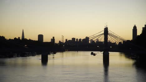 london thames dawn skyline through albert bridge from battersea bridge looking towards vauxhall 4k