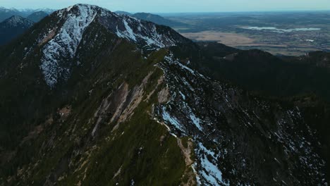cinematic drone aerial at bavarian alps mountains at lake walchensee and kochelsee and alpine foothills