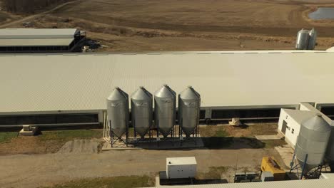 Drone-shot-of-a-grain-bin-collection-on-a-hog-farm-in-illinois