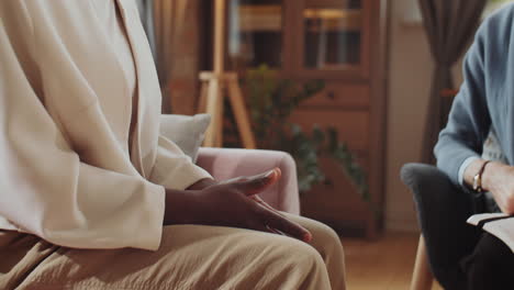 Hands-of-Psychologist-Comforting-African-American-Woman-on-Session