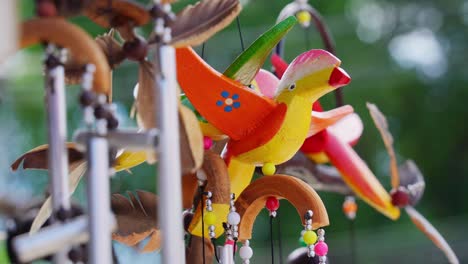 colorful wooden bird wind chimes