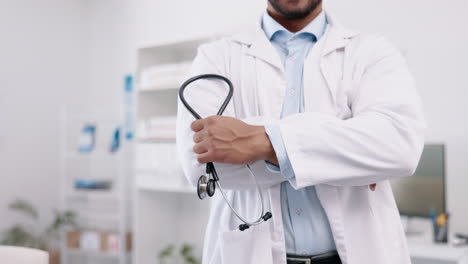 healthcare, arms crossed and hands of a doctor