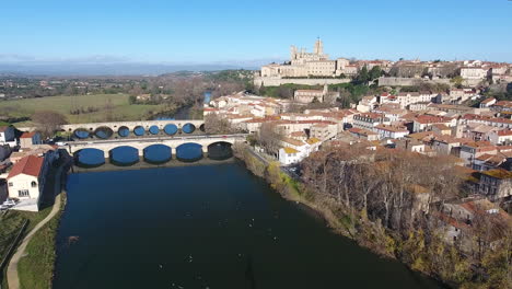 aerial drone view of beziers orb river and bridges