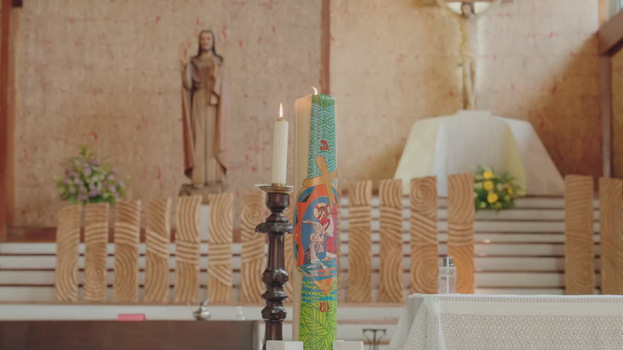Close view of altar candles and sanctuary interior in church