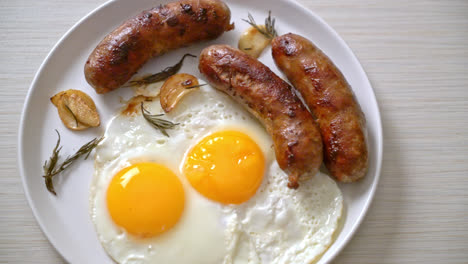 homemade-double-fried-egg-with-fried-pork-sausage---for-breakfast