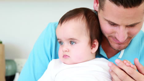 Father-playing-with-his-cute-baby-boy