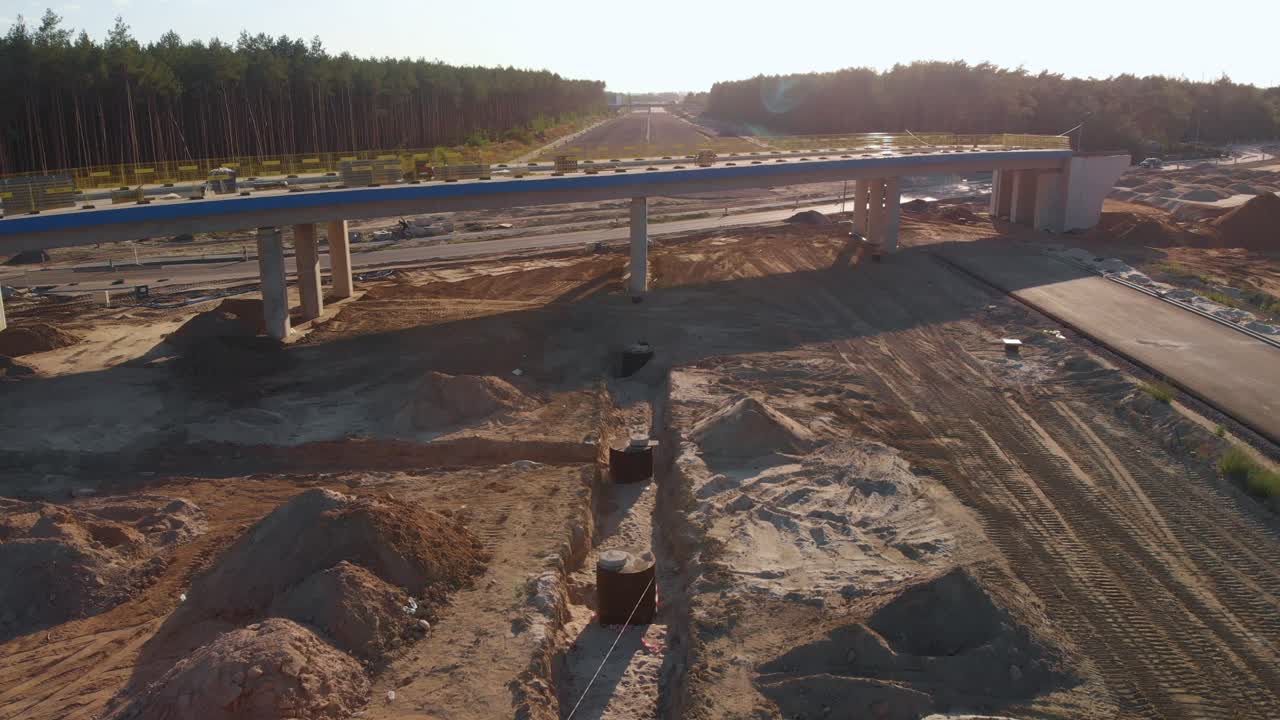 Aerial close shot of a viaduct over the new highway construction site