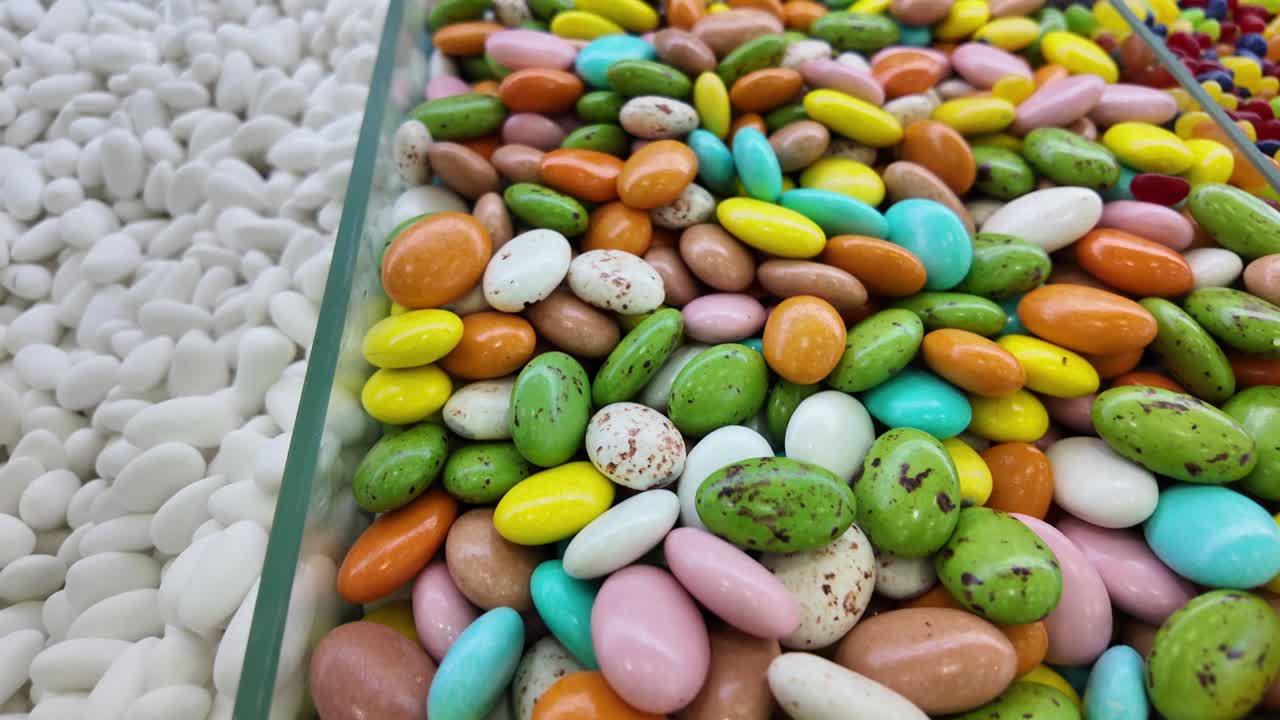Colorful Assortment of Sugar-Coated Candies and Nuts