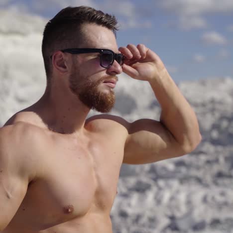 portrait of muscle man posing outdoor