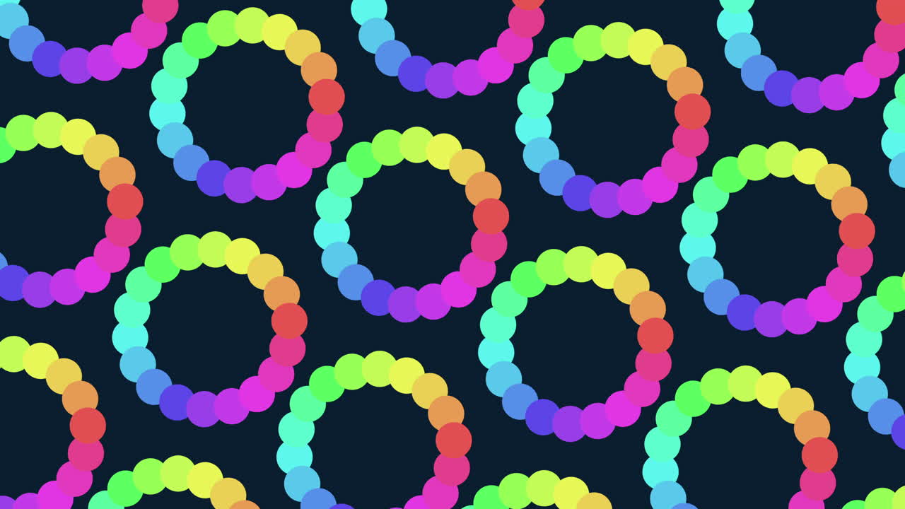 검은 바탕에 대칭적인 무지개 원 패턴