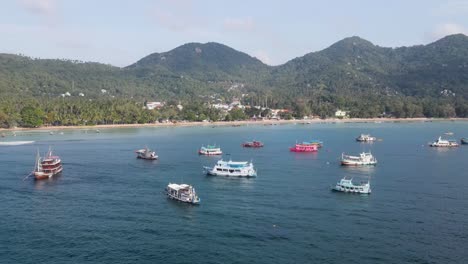 Aerial-View-Over-Moored-Boats-In-Gulf-Of-Thailand-Near-Sairee-Beach