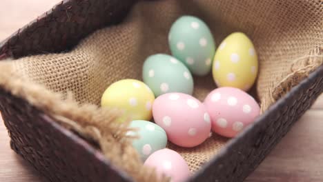 pastel spotted easter eggs in a basket