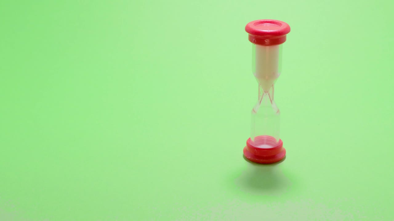 hourglass clock sand on chromakey isolated copy space time goes by