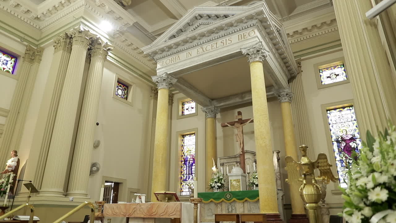 Panning shot of chancel - altar inside a catholic church