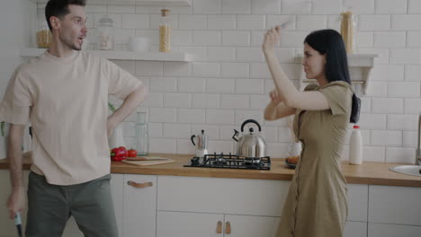 couple having fun in kitchen