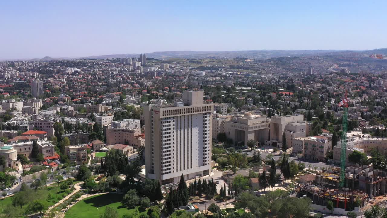 Aerial view of Jerusalem's cityscape featuring the King David Hotel and surrounding urban landscape