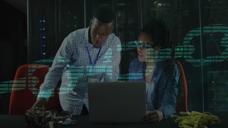 Animation of digital chain over african american couple using laptop in server room