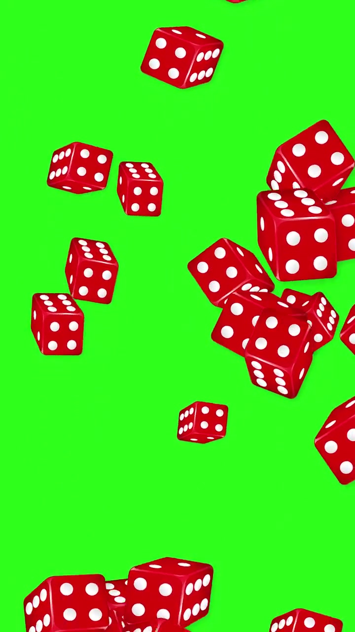 Dadi rossi che cadono su uno sfondo green screen