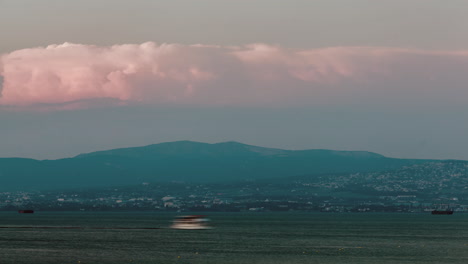 timelapse of evening coming to the coastal city