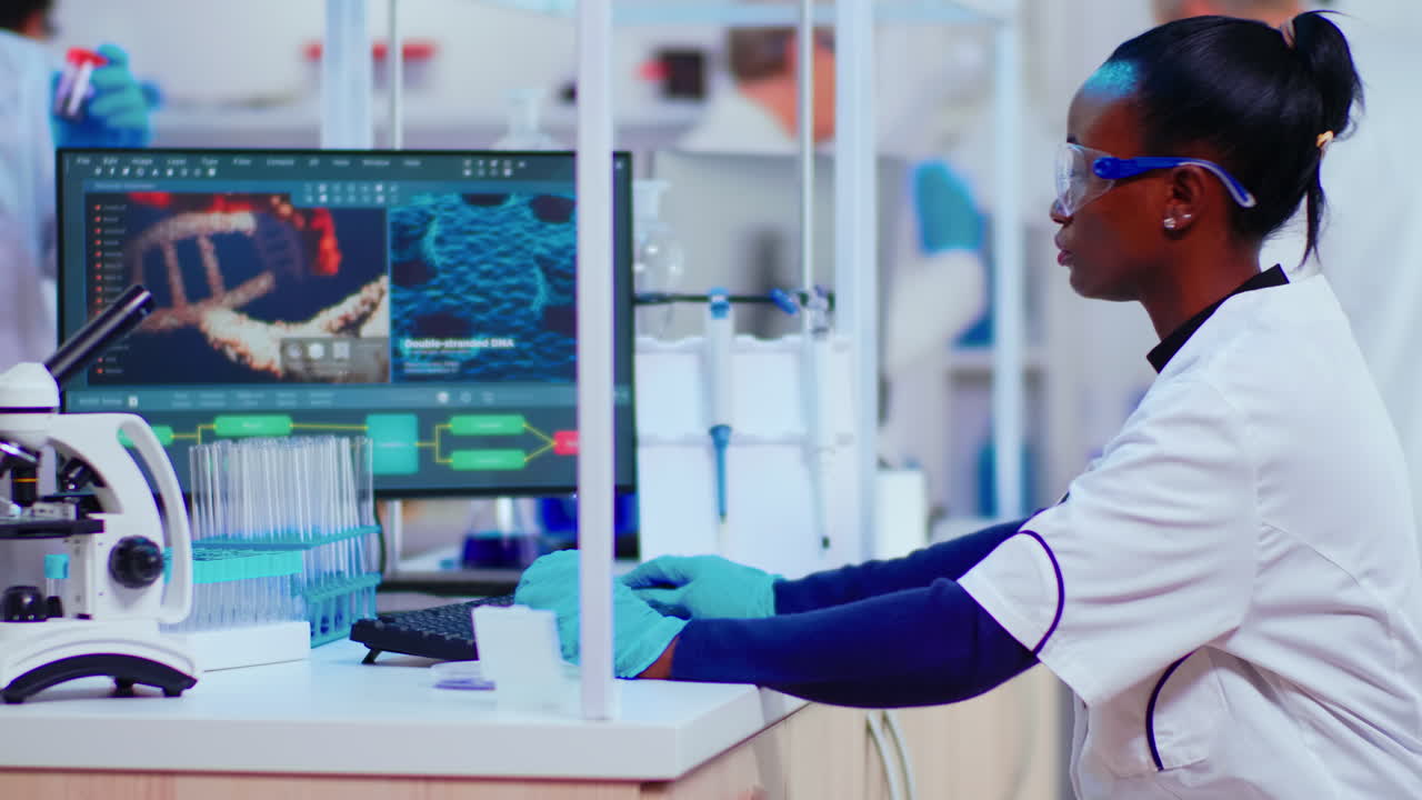 African woman biochemist researcher checking manifestations of vaccine