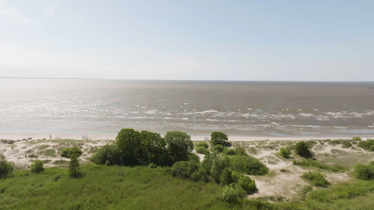 Aerial view rising around the Parnu beach, sunny, summer day in Estonia