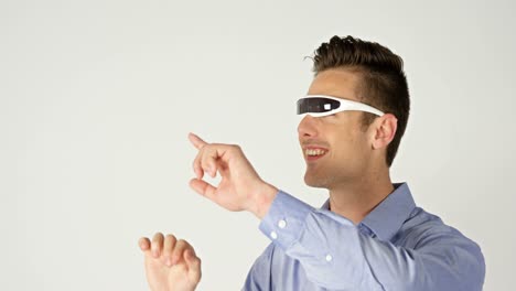 man using visual reality headset on white background