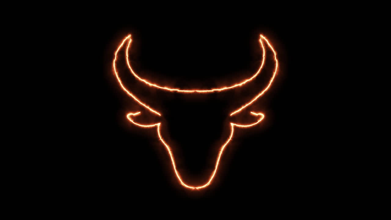 네온 불빛에 불타는 황소 머리와 황소 얼굴